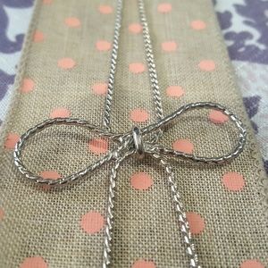 Long bow-tie necklace